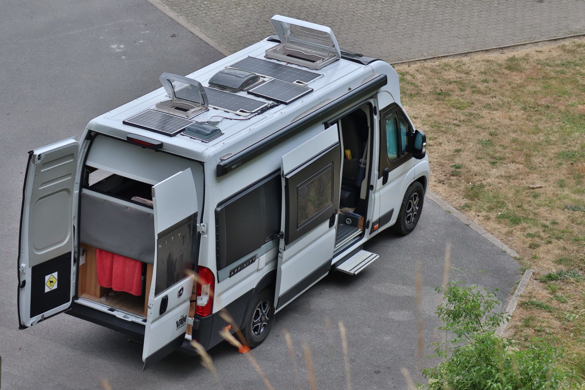 Top view of a campervan roof fitted with solar panels